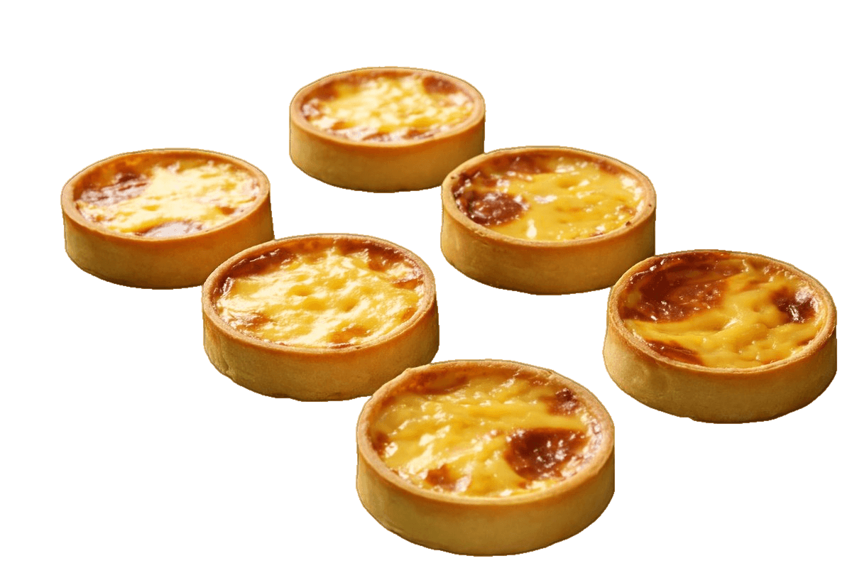 Vanilla pudding tarts with golden, lightly freckled custard surfaces